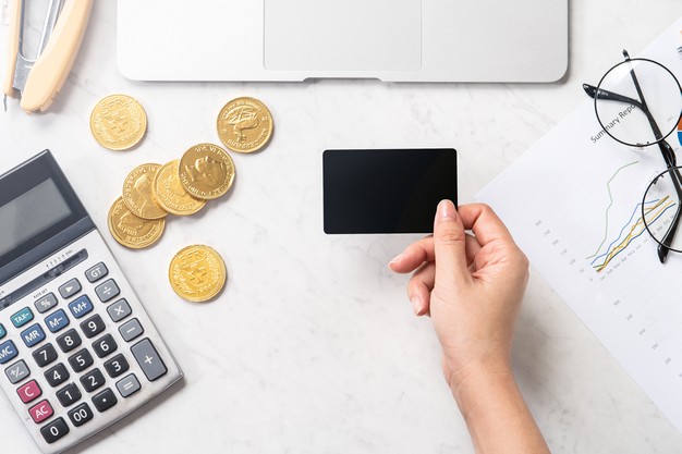woman is doing online payment with card smartphone isolated modern marble office table 315337 1666